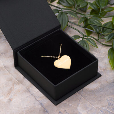A personalized Mom Engraved Silver Heart Necklace
